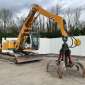 LIEBHERR R317 LITRONIC + grappin d'occasion d'occasion