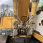 LIEBHERR R317 LITRONIC + grappin d'occasion d'occasion