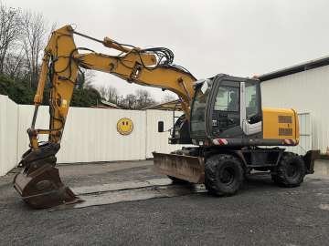 Excavator (wheeled) Hitachi Zx220w-5b used - Excavators (Wheeled