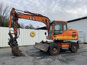 Excavator (Wheeled) used for heavy construction, hydraulic