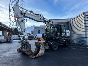Excavator (wheeled) Hitachi Zx220w-5b used - Excavators (Wheeled