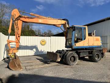 Excavator (wheeled) Hitachi Zx220w-5b used - Excavators (Wheeled