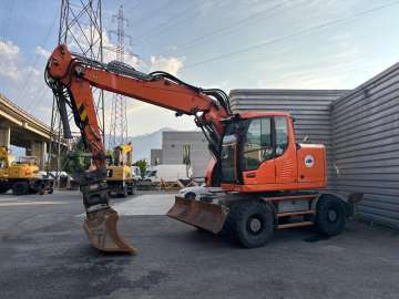 Excavator (wheeled) Hitachi Zx220w-5b used - Excavators (Wheeled