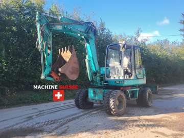 Pelle Sur Pneus KOMATSU PW95 d'occasion