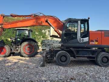 Excavator (Wheeled) used for heavy construction, hydraulic